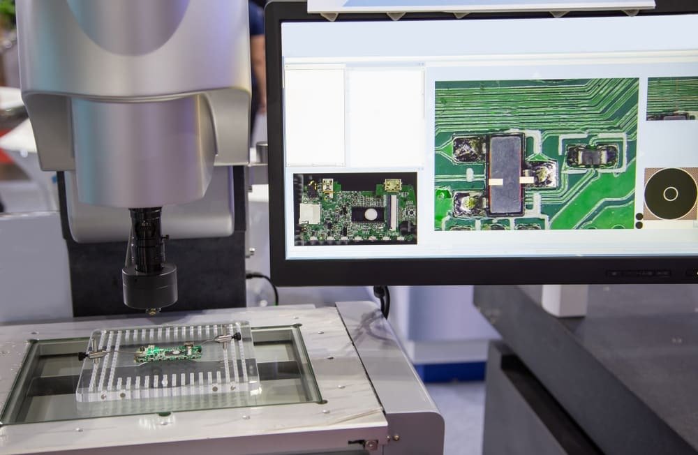High-precision optical punch system aligning PCB layers and performing automated optical inspection to ensure accuracy and quality.